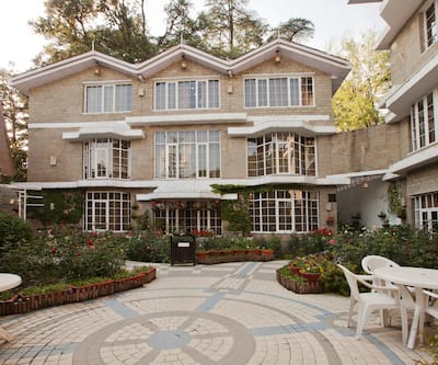 https://imgcld.yatra.com/ytimages/image/upload/t_hotel_yatra_city_desktop/v1391022753/Domestic Hotels/Hotels_Shimla/Hotel East Bourne Resort and Spa/Facade~8.jpg